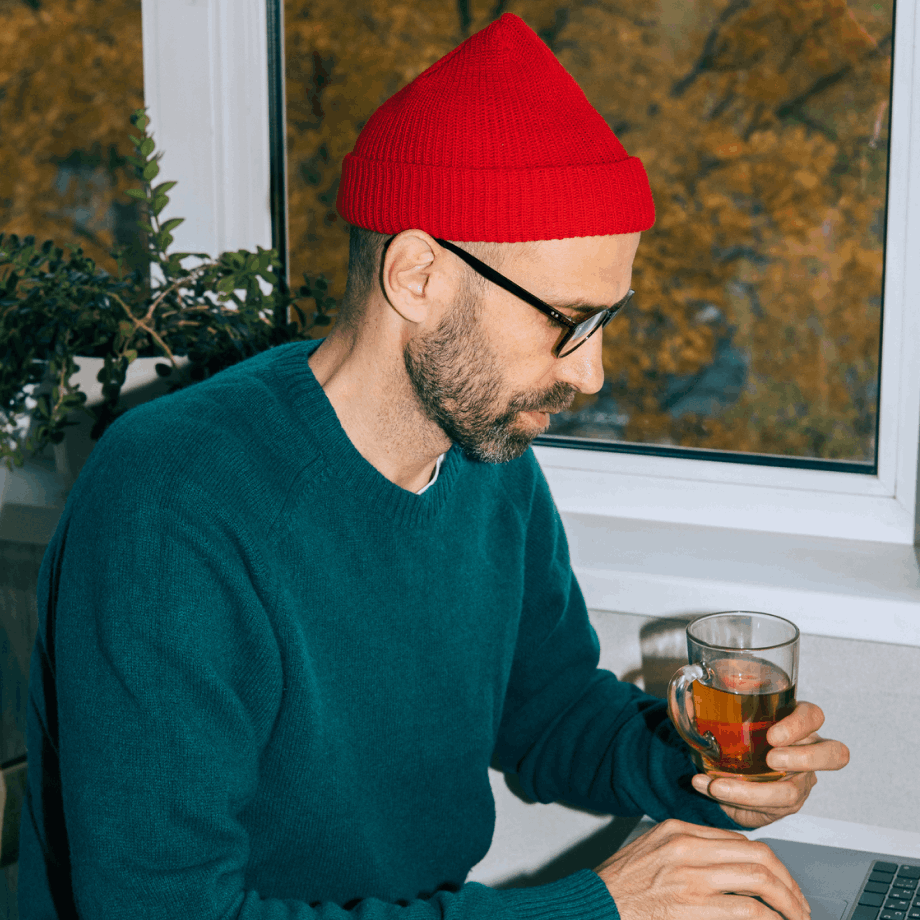 man with red hat