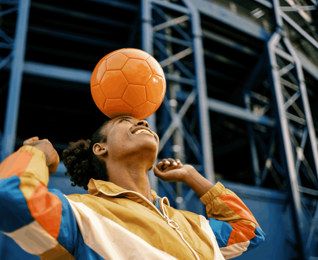 young woman with football